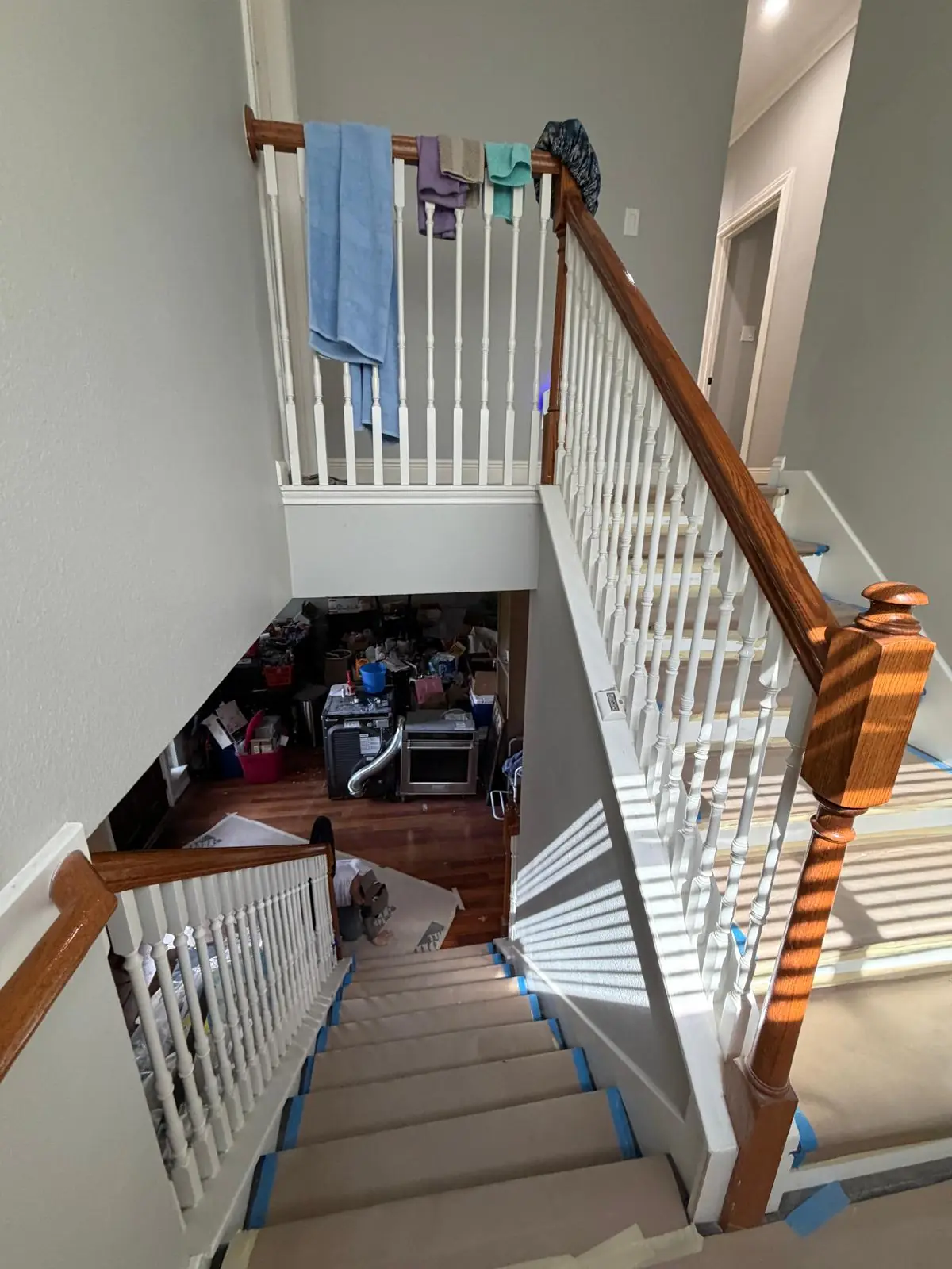 Carpeted stairs to wood-look treads: Before